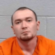 Authorities have identified Noah Tribioli, a Pennsylvania resident, as the suspect in a fatal shooting that occurred Saturday morning in Calhoun County, West Virginia. The incident, which unfolded at a residence along the 5900 block of Pine Creek Road near Mount Zion, left two people dead and two others injured, one critically.