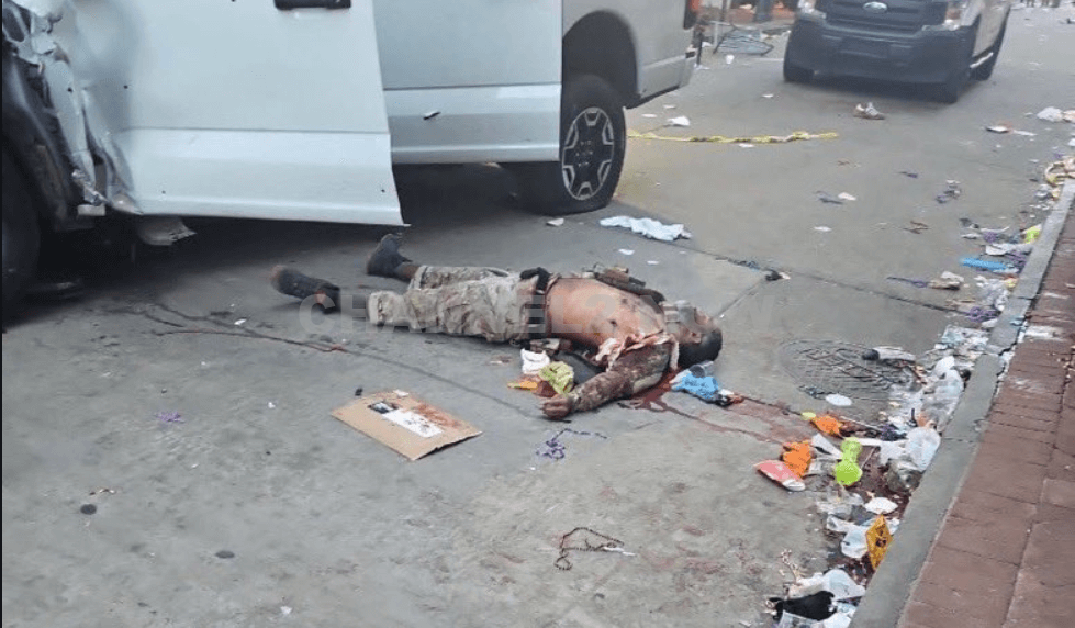 A graphic image circulating online depicts the suspected perpetrator of the New Orleans car-ramming attack lying deceased outside a heavily damaged vehicle.