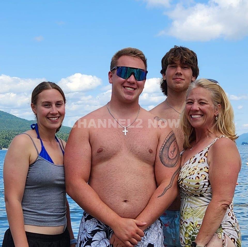 Rhonda Dorgan, right, with three of her children in August 2024. She served Robert Dorgan (not pictured) with divorce in 2020