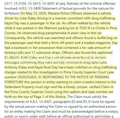 Day is identified as the girlfriend of Luke Anthony Daley, who was detained the following day, February 13, 2026, during a SWAT operation at a residence in the 6200 block of North Placita de Rojelio in Tucson.